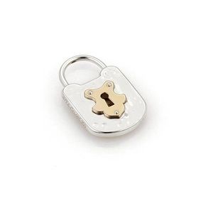 Tiffany & Co Hammered Lock Pendant